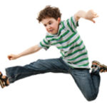 Boy jumping isolated on white